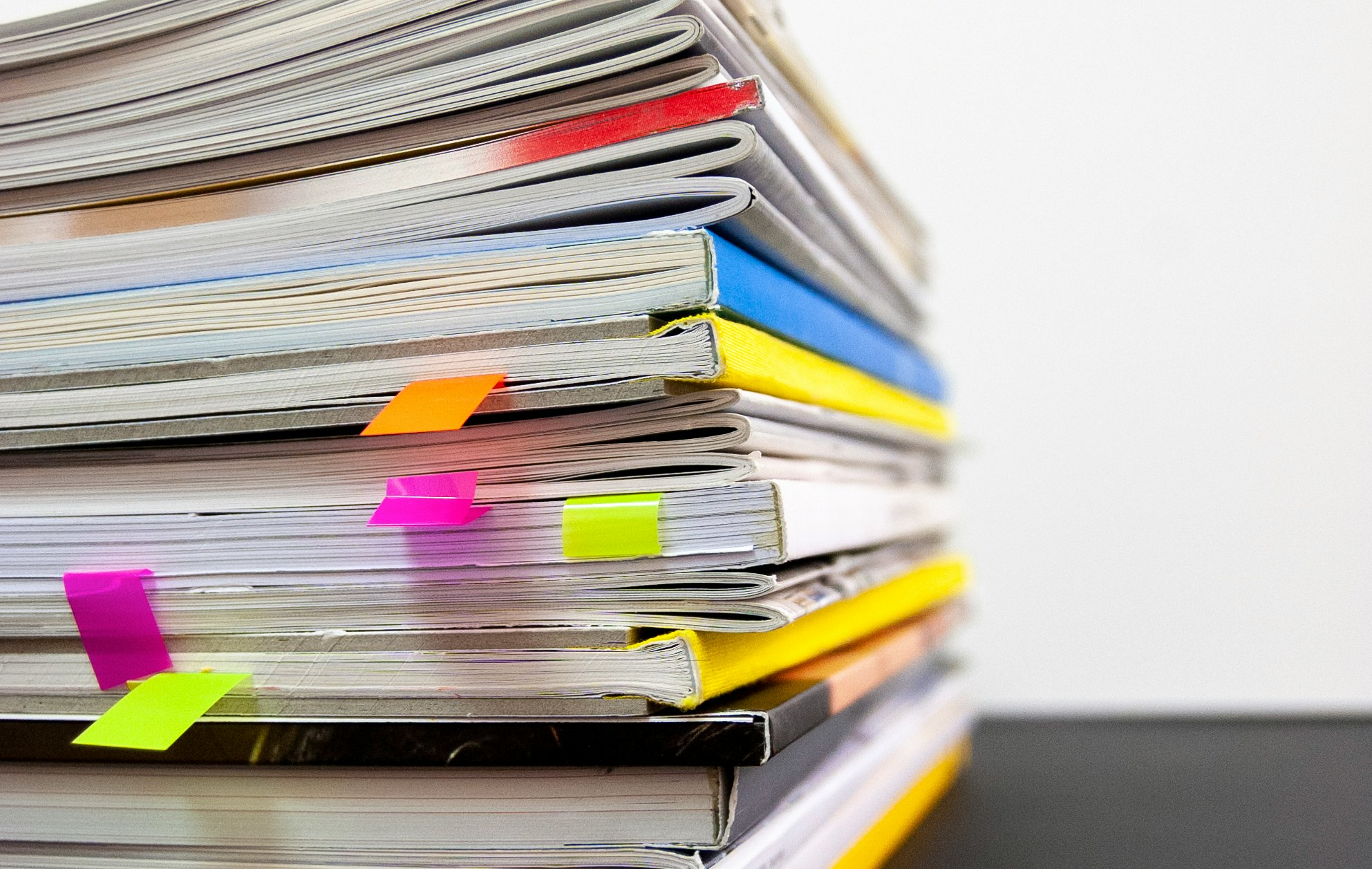 A photo of stacked journals.